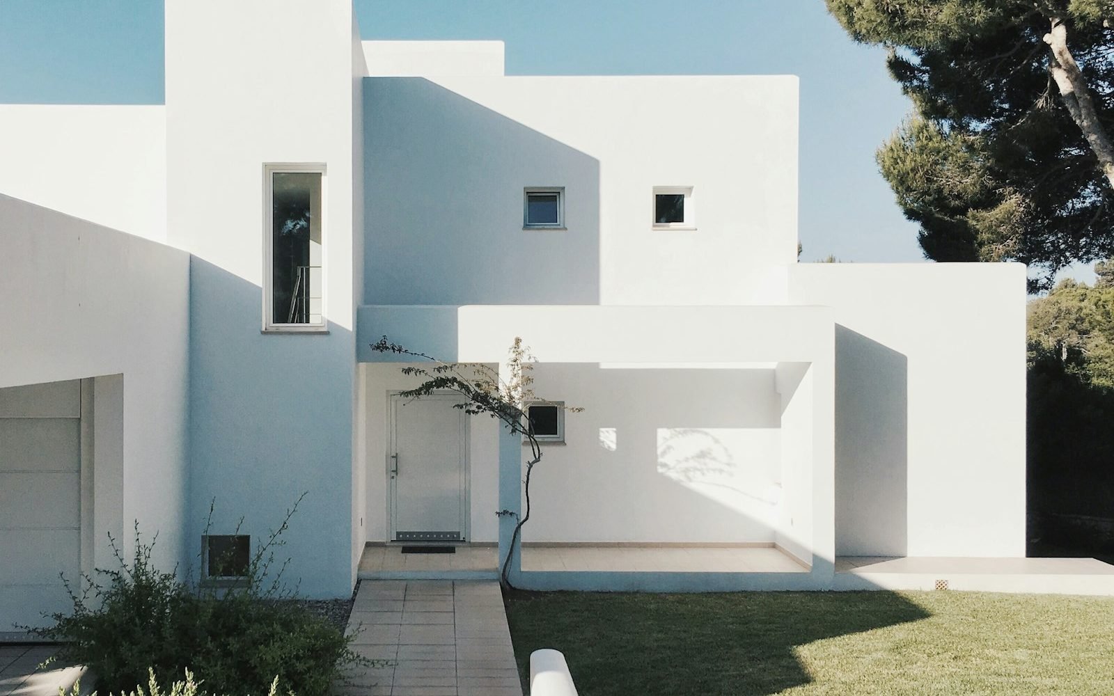 White farmhouse-style home