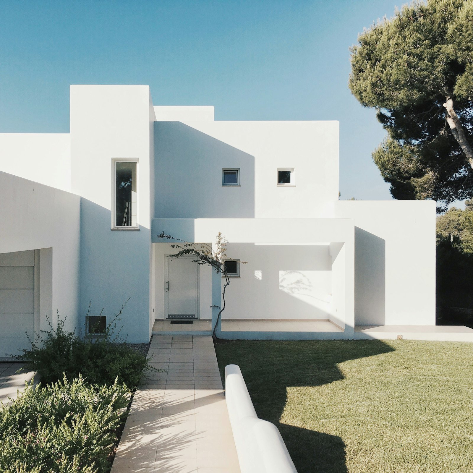 White farmhouse-style home